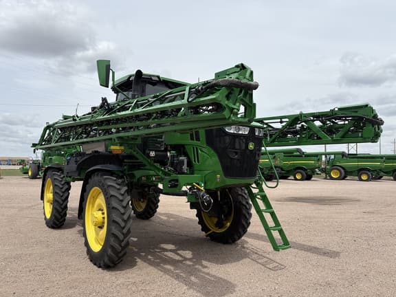 Image of John Deere 412R equipment image 1