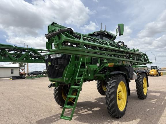 Image of John Deere 412R equipment image 1
