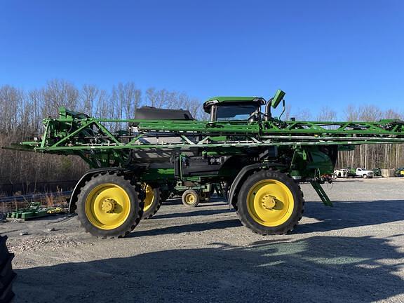 Image of John Deere 412R equipment image 1