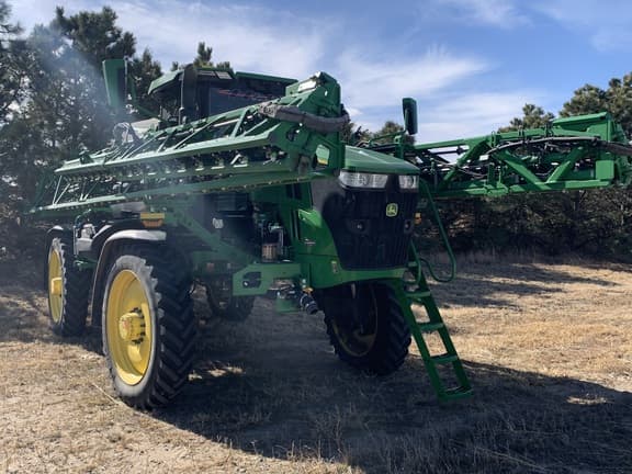 Image of John Deere 412R equipment image 1