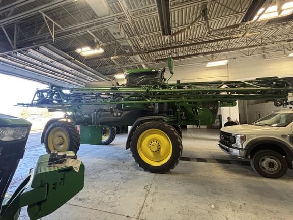 Image of John Deere 412R equipment image 1