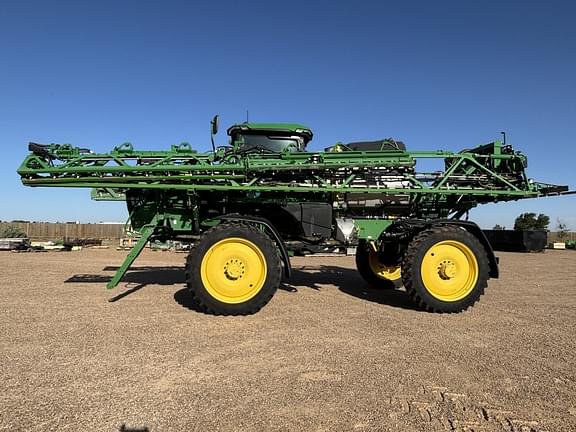 Image of John Deere 412R equipment image 1