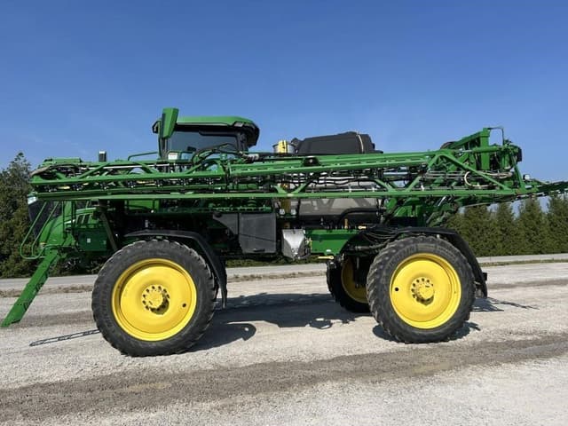 Image of John Deere 412R equipment image 1