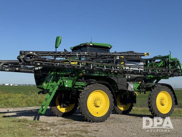 Image of John Deere 412R equipment image 4