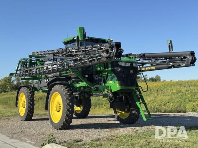 Image of John Deere 412R equipment image 1