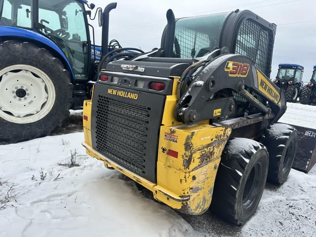 Image of New Holland L318 equipment image 4
