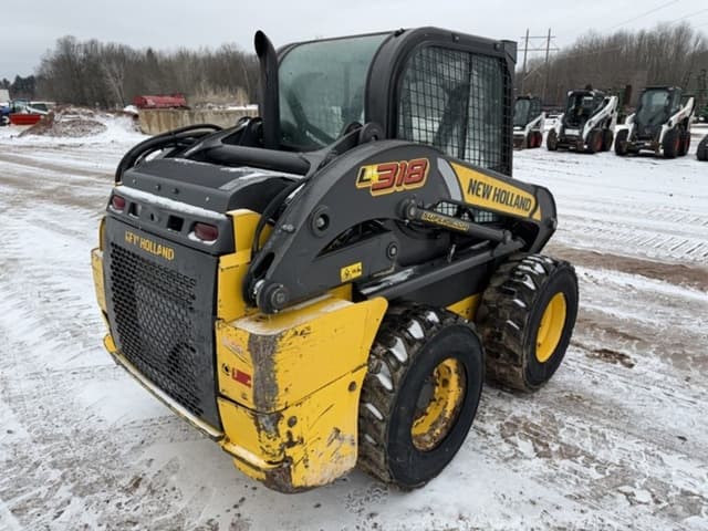 Image of New Holland L318 equipment image 4