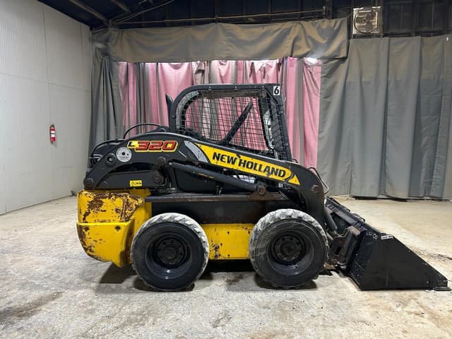 Image of New Holland L320 equipment image 4
