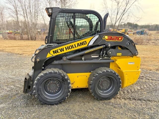 Image of New Holland L320 equipment image 4