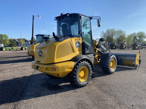 Image of John Deere 324P equipment image 4