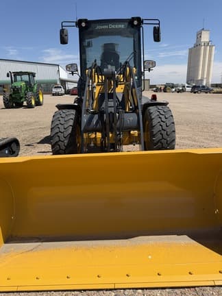 Image of John Deere 324P equipment image 4