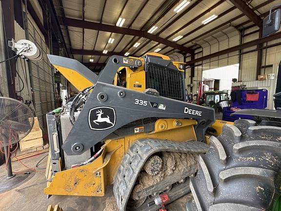 Image of John Deere 335P equipment image 4