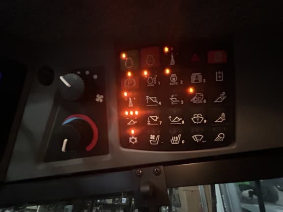 Image of John Deere 335P equipment image 4