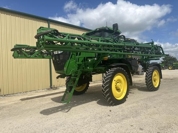 Image of John Deere 412R equipment image 1