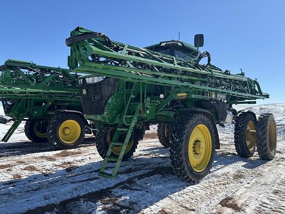 Image of John Deere 412R equipment image 1