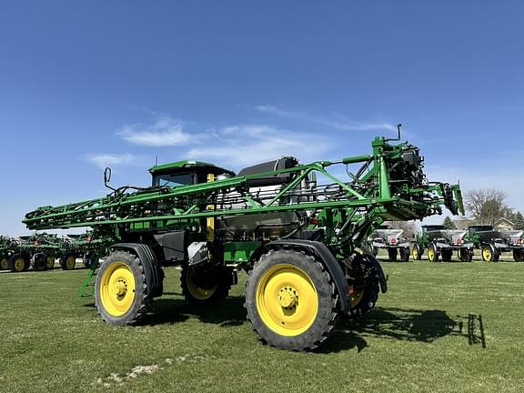 Image of John Deere 412R equipment image 4