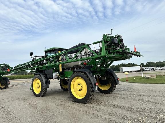 Image of John Deere 412R equipment image 4