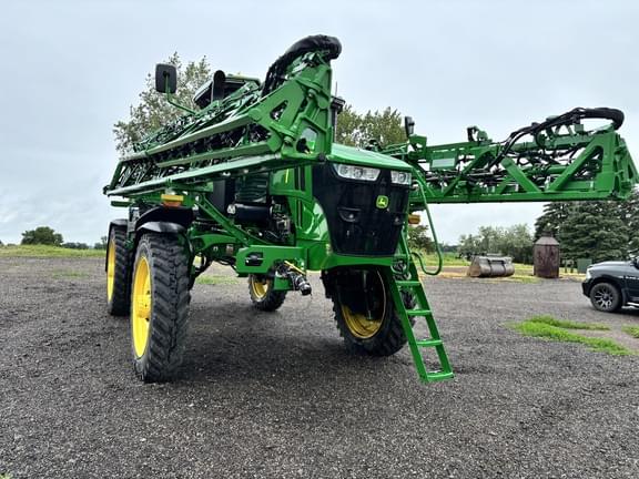 Image of John Deere 412R equipment image 1