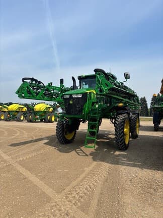 Image of John Deere 412R equipment image 4