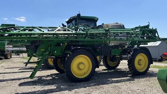 Image of John Deere 412R equipment image 1