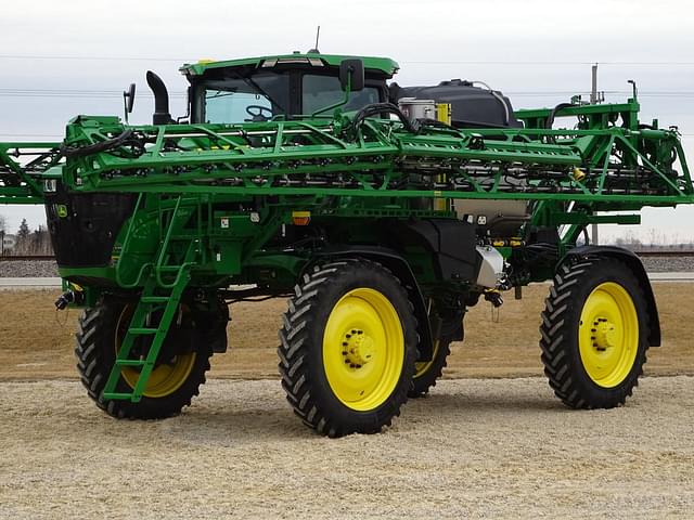 Image of John Deere 412R equipment image 1