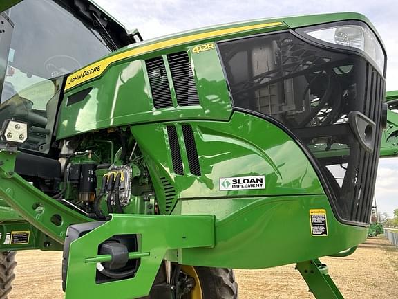 Image of John Deere 412R equipment image 1