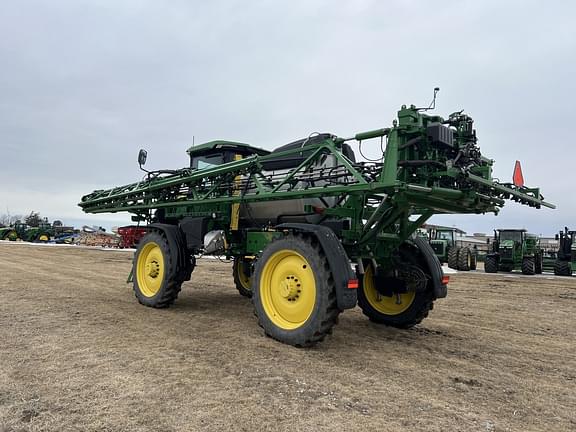Image of John Deere 412R equipment image 4