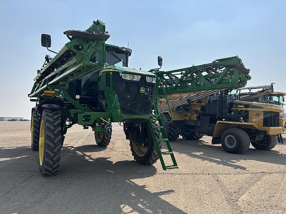 Image of John Deere 412R equipment image 1