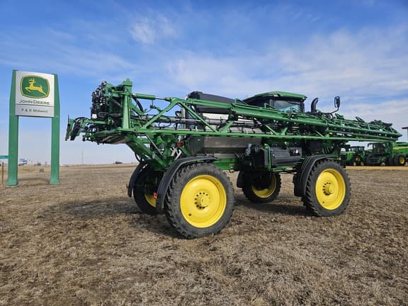 Image of John Deere 412R equipment image 4