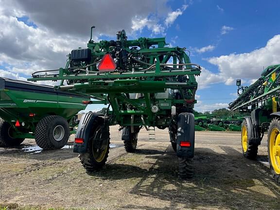 Image of John Deere 412R equipment image 4