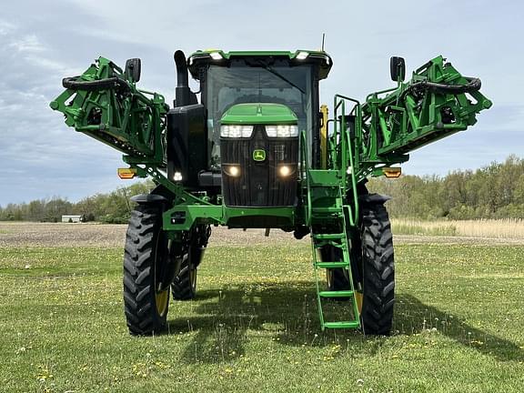 Image of John Deere 412R equipment image 1