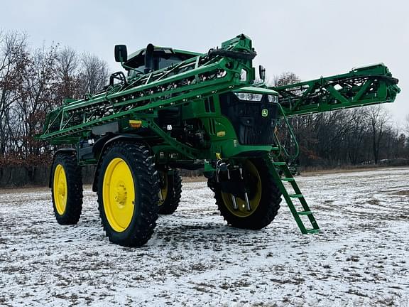 Image of John Deere 412R equipment image 1