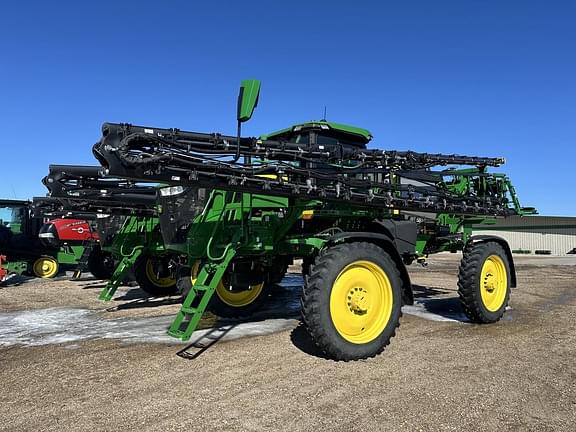 Image of John Deere 412R equipment image 1
