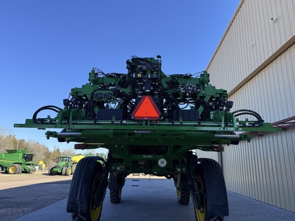 Image of John Deere 412R equipment image 4