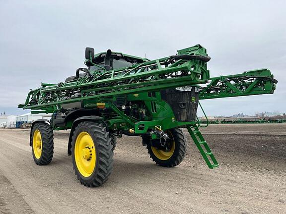 Image of John Deere 412R equipment image 4
