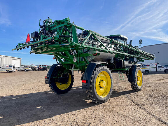 Image of John Deere 412R equipment image 4