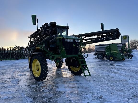 Image of John Deere 412R equipment image 1