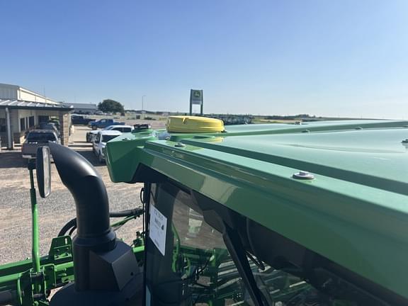 Image of John Deere 412R equipment image 4