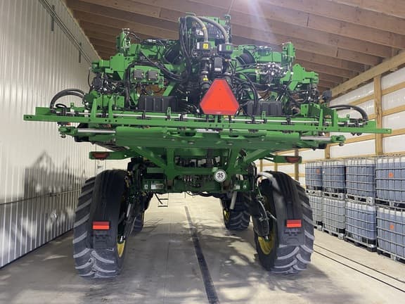 Image of John Deere 412R equipment image 4