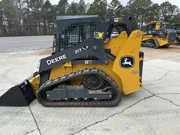 Image of John Deere 317P equipment image 4