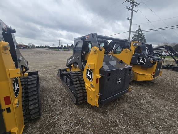 Image of John Deere 317P equipment image 4