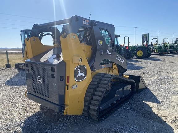 Image of John Deere 317G equipment image 4