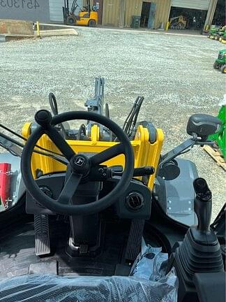 Image of John Deere 324P equipment image 4