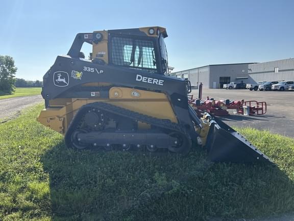 Image of John Deere 335P equipment image 4