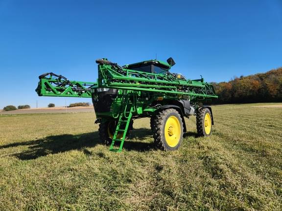 Image of John Deere 412R equipment image 1