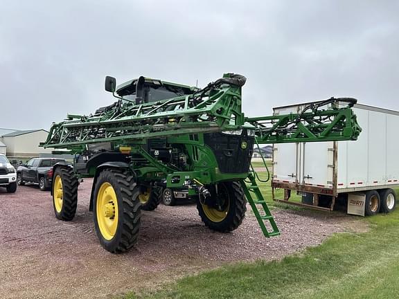 Image of John Deere 412R equipment image 1