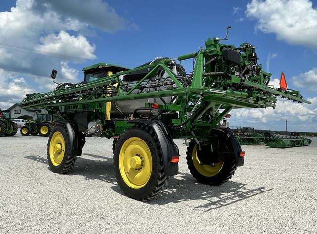Image of John Deere 412R equipment image 4