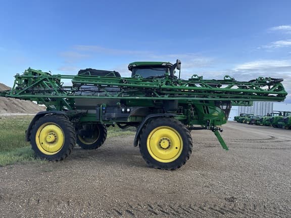 Image of John Deere 412R equipment image 4