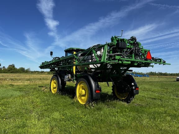 Image of John Deere 412R equipment image 4