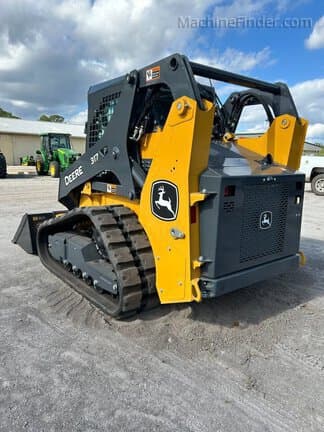 Image of John Deere 317P equipment image 4